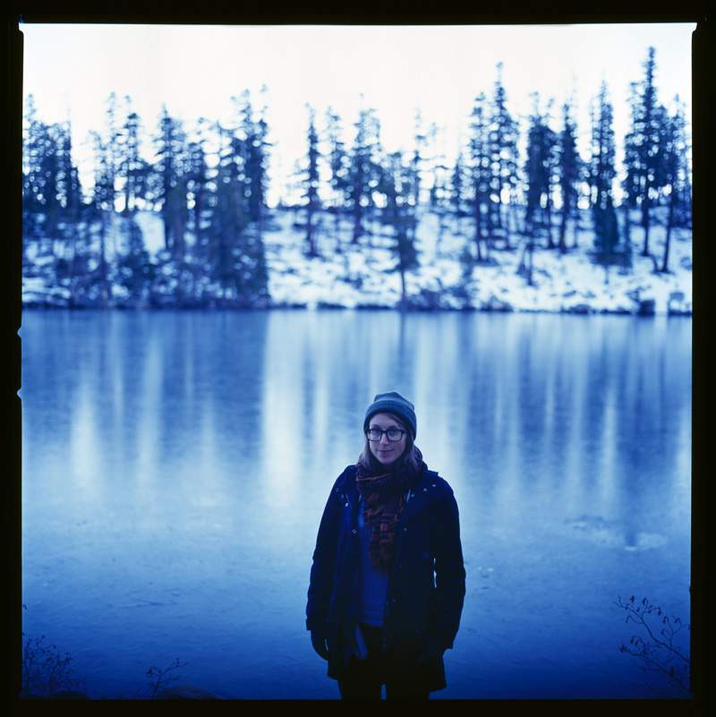 After several hours hiking, Lauren stands in front of Granite Lake, which is frozen, as the sun goes down. Everything was so blue from the reflection of the fading light off the snow covered ground and icy lake. 