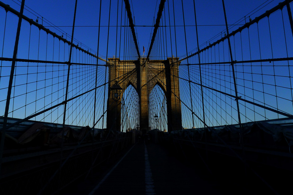 Sunset on the Brooklyn Bridge. Taken while riding my bicycle.