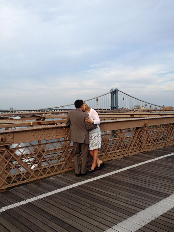Sharing a kiss on the Brooklyn Bridge. Taken on July 31, 2013.